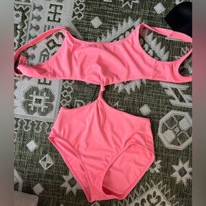 Solid and striped pink cut out bathing suit